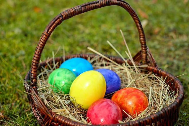 Coloured eggs in a basket, as if being used for Easter activities